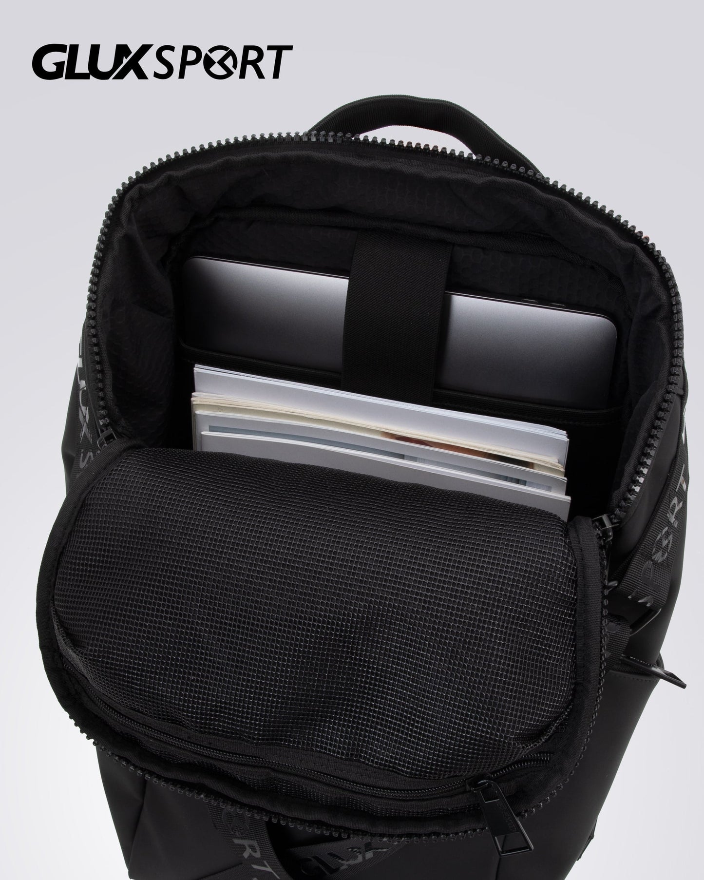 Interior view of GLUX fashionable men's backpack featuring padded laptop compartment and organized storage