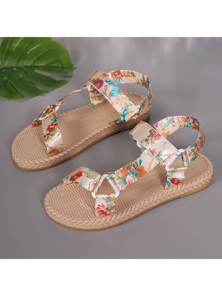 Wholesale7 floral print flat sandals with adjustable straps and woven sole in beige and multicolor