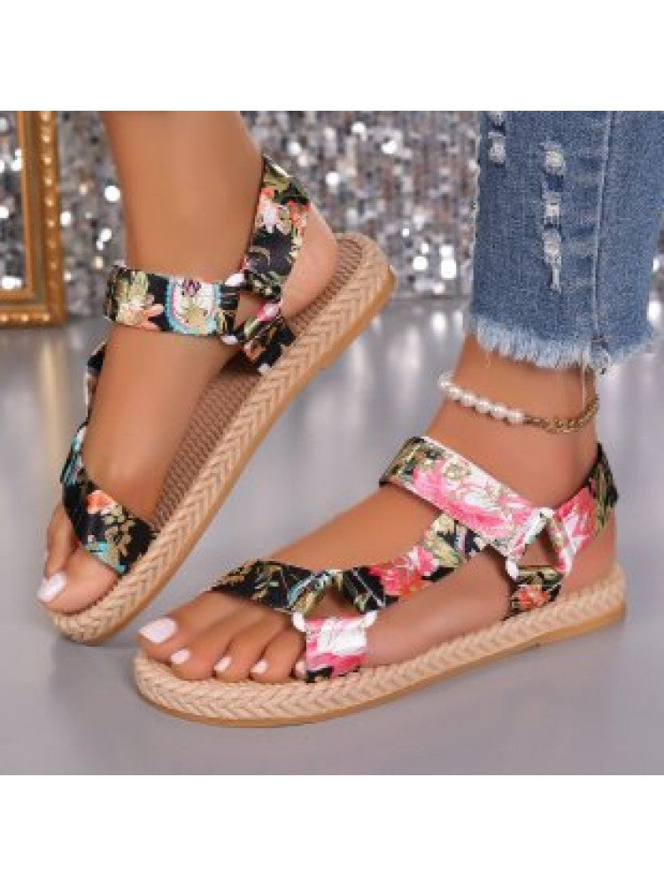 Wholesale7 floral print flat sandals with braided sole and adjustable straps on feet