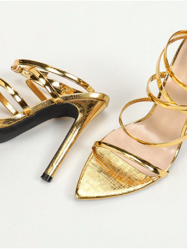 Golden flower stiletto sandals with stylish metallic straps and pointed toe design