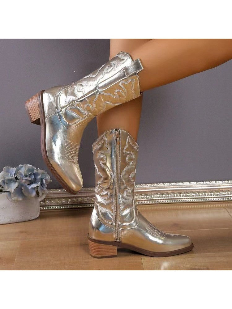 Wholesale7 glossy pointed toe boots in shiny silver with decorative stitching and low wooden heel
