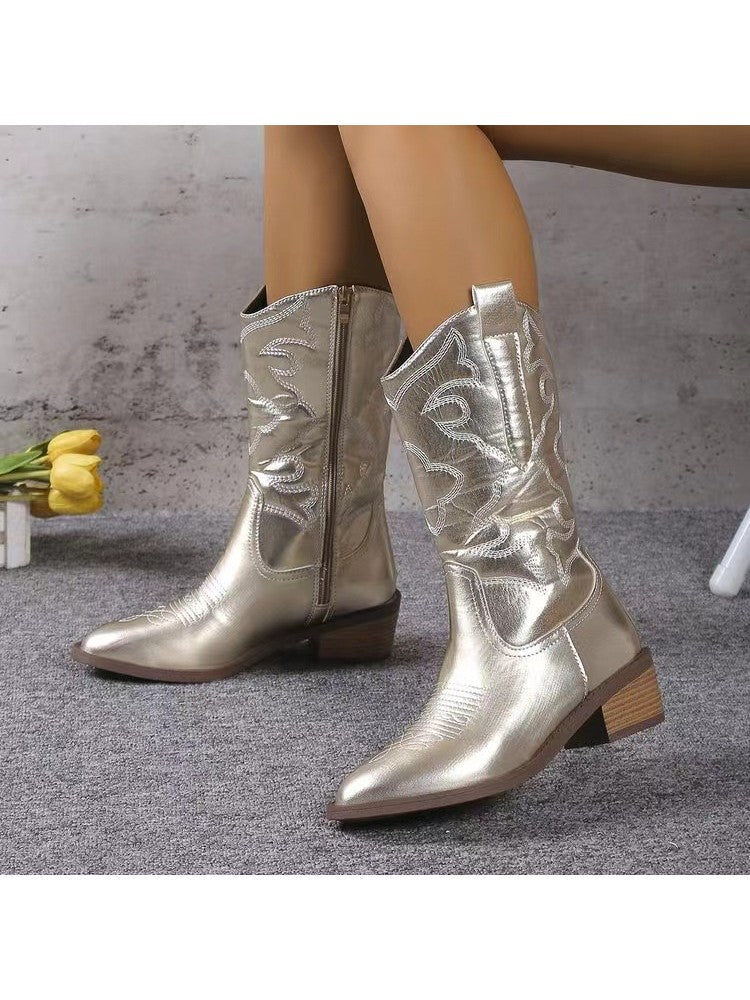 Wholesale7 glossy pointed toe boots in metallic silver with embroidered design and side zipper
