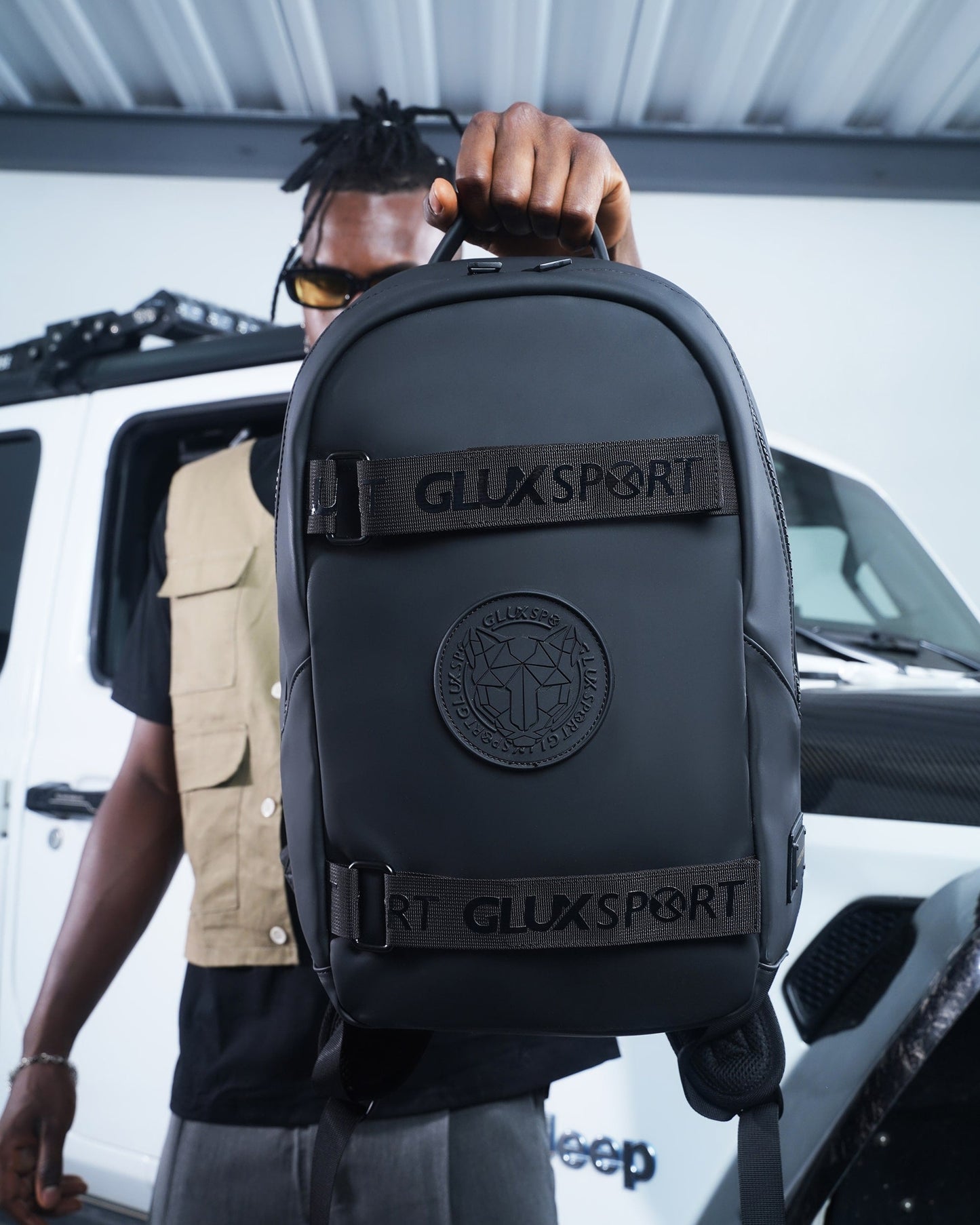 Glux men's backpack in black with logo and adjustable straps, perfect for outdoor adventures