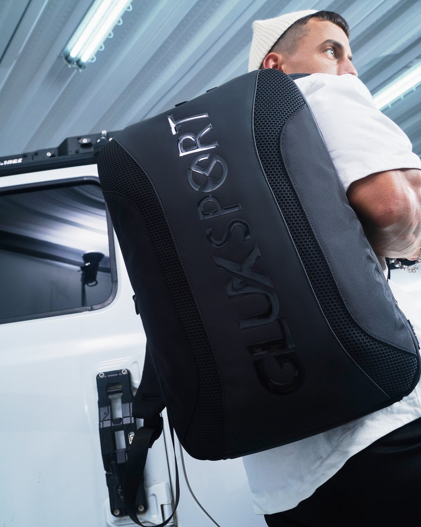Glux men's sports backpack in black with logo design, ideal for active lifestyles and daily use