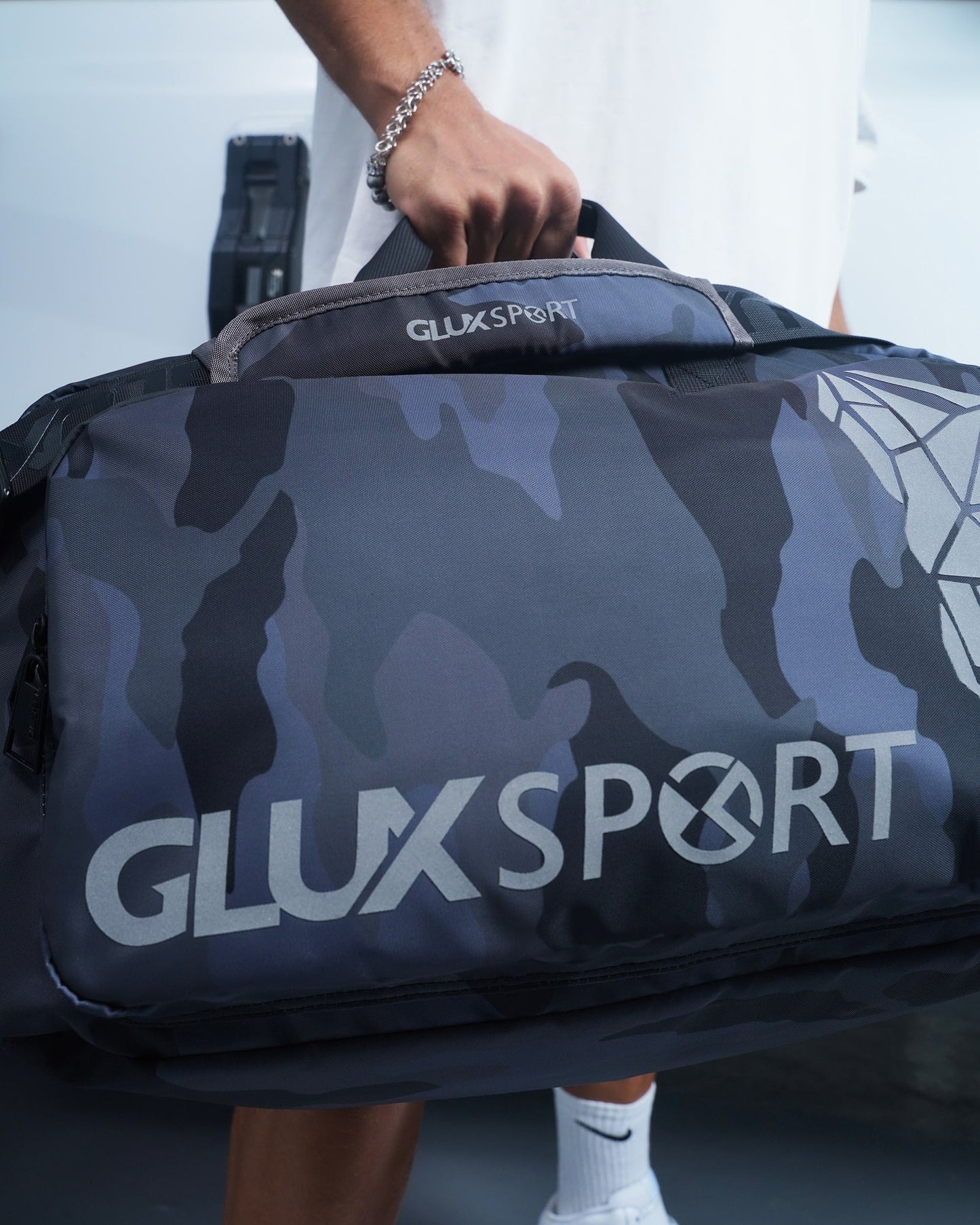 GLUX sports crossbody bag in a stylish camouflage design, perfect for daily use and workouts