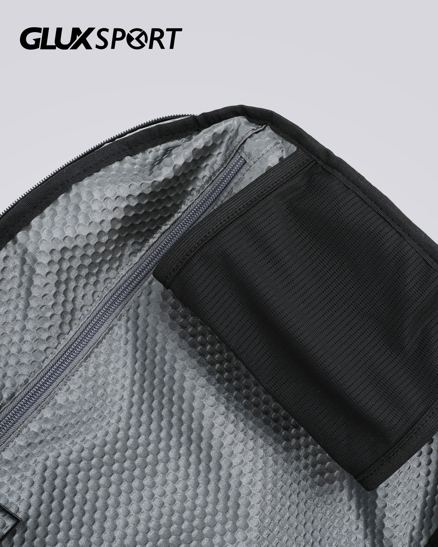 Interior view of the GLUX sports crossbody bag featuring a spacious compartment and sleek design