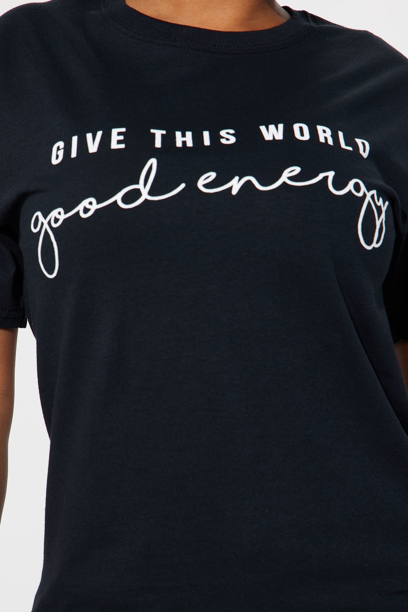 Fashion Nova good energy graphic tee in black with white text for a stylish and positive look