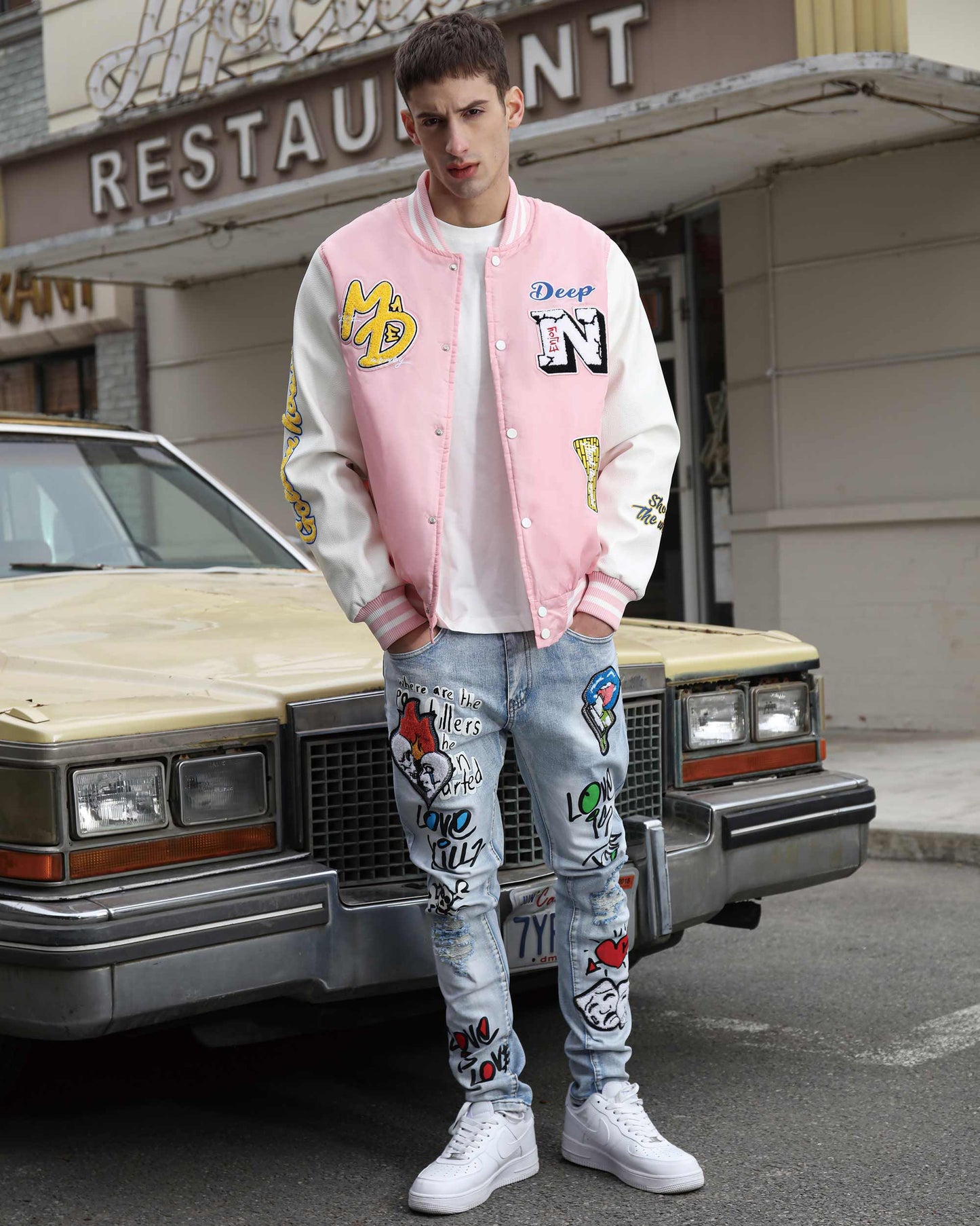 Logeqi graffiti painted jeans featuring vibrant designs for a trendy streetwear look