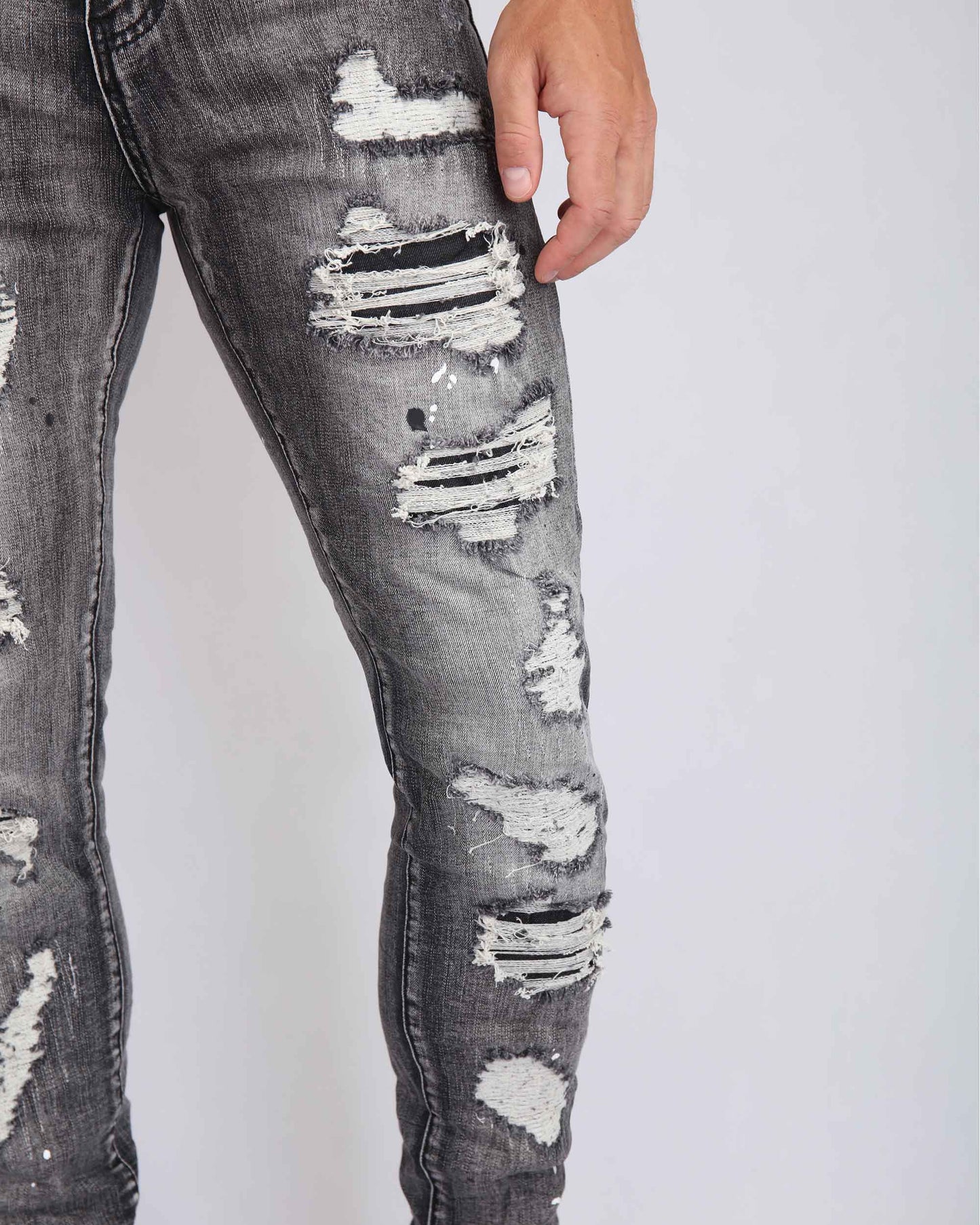 Logeqi graffiti ripped jeans with distressed detail and a stylish fit for casual wear