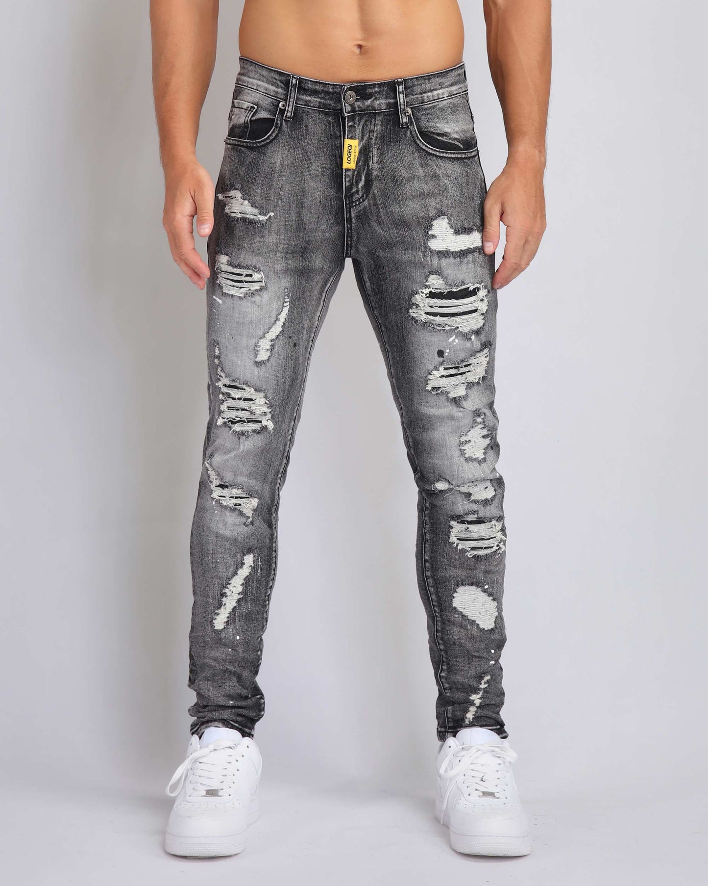 Logeqi graffiti ripped jeans in grey with distressed detailing and a slim fit design