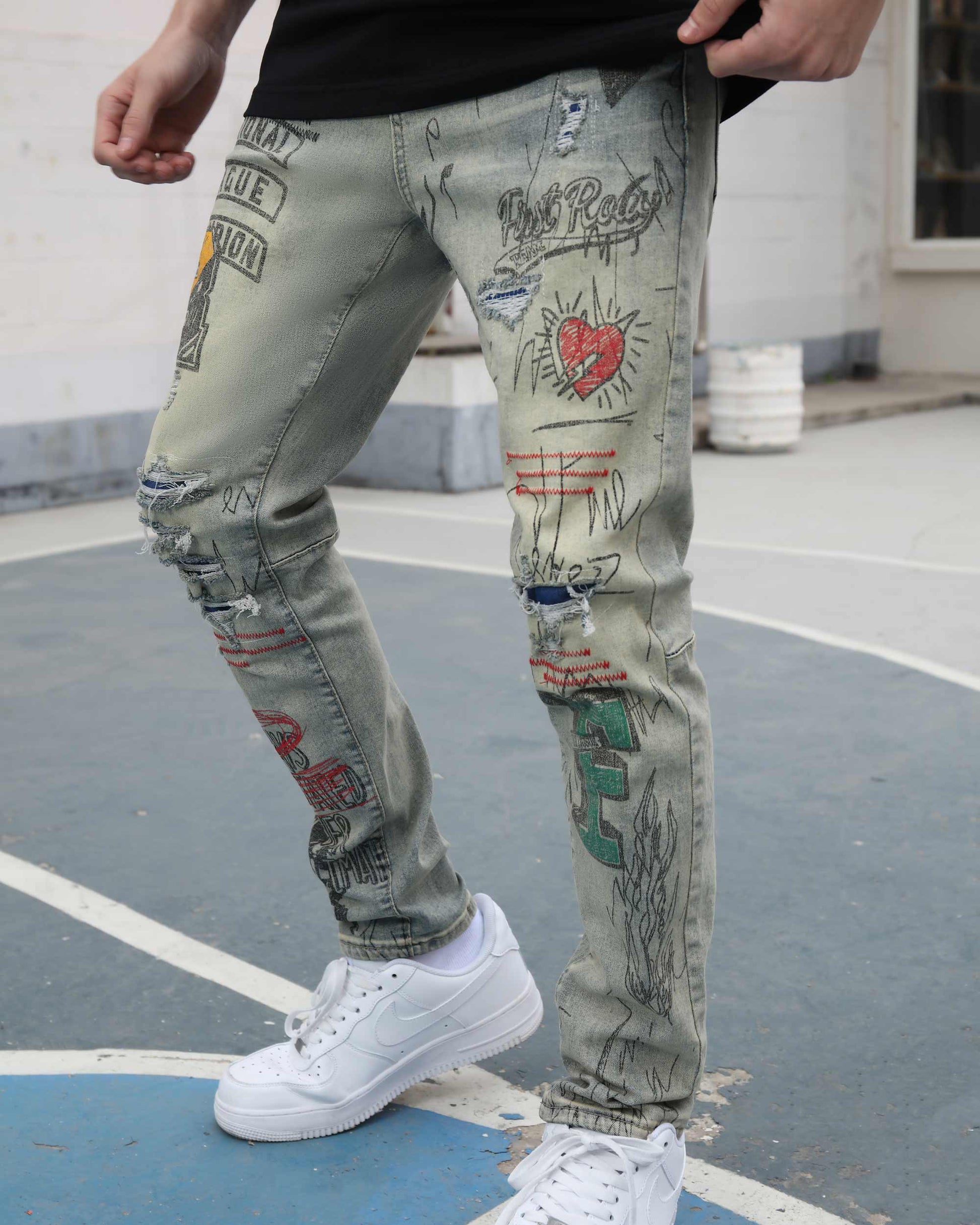 Logeqi graffiti ripped jeans with unique designs and distressed detailing for a trendy look