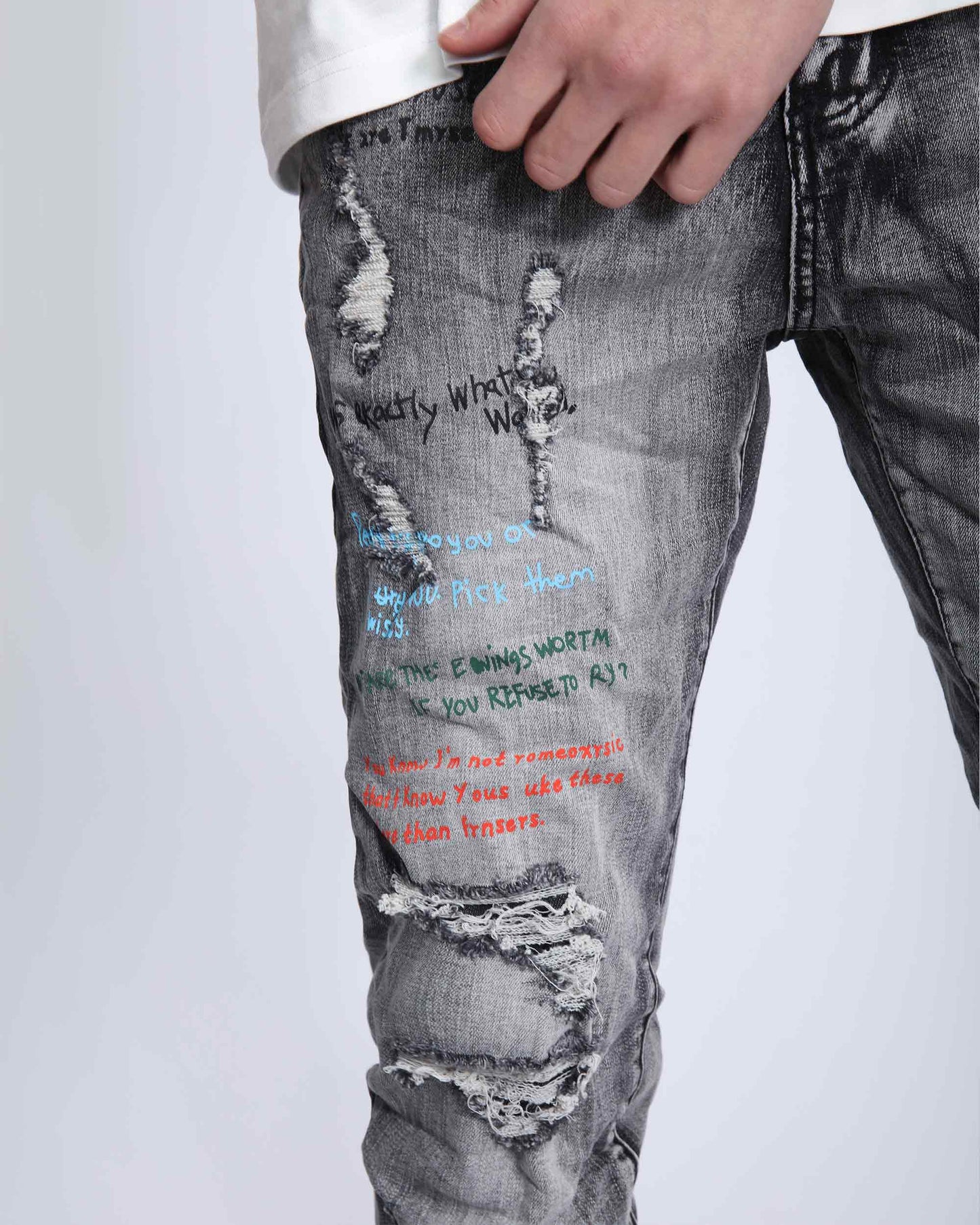 Logeqi gray slim fit jeans with distressed detailing and graffiti-style writing