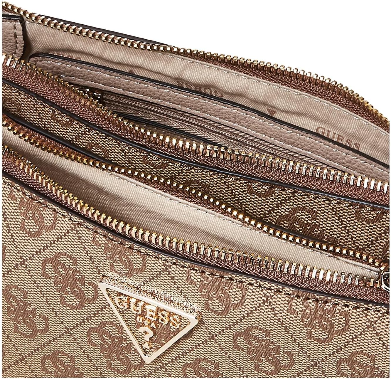 Interior view of GUESS Noelle crossbody bag showcasing multiple zipper compartments for organized storage