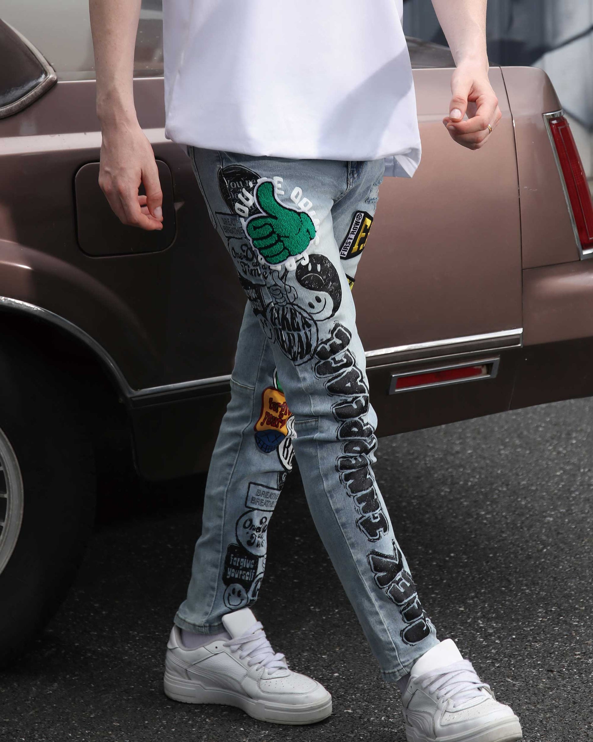 Logeqi Hip Hop Slim Fit Jeans with unique graphic designs and patches for a stylish streetwear look