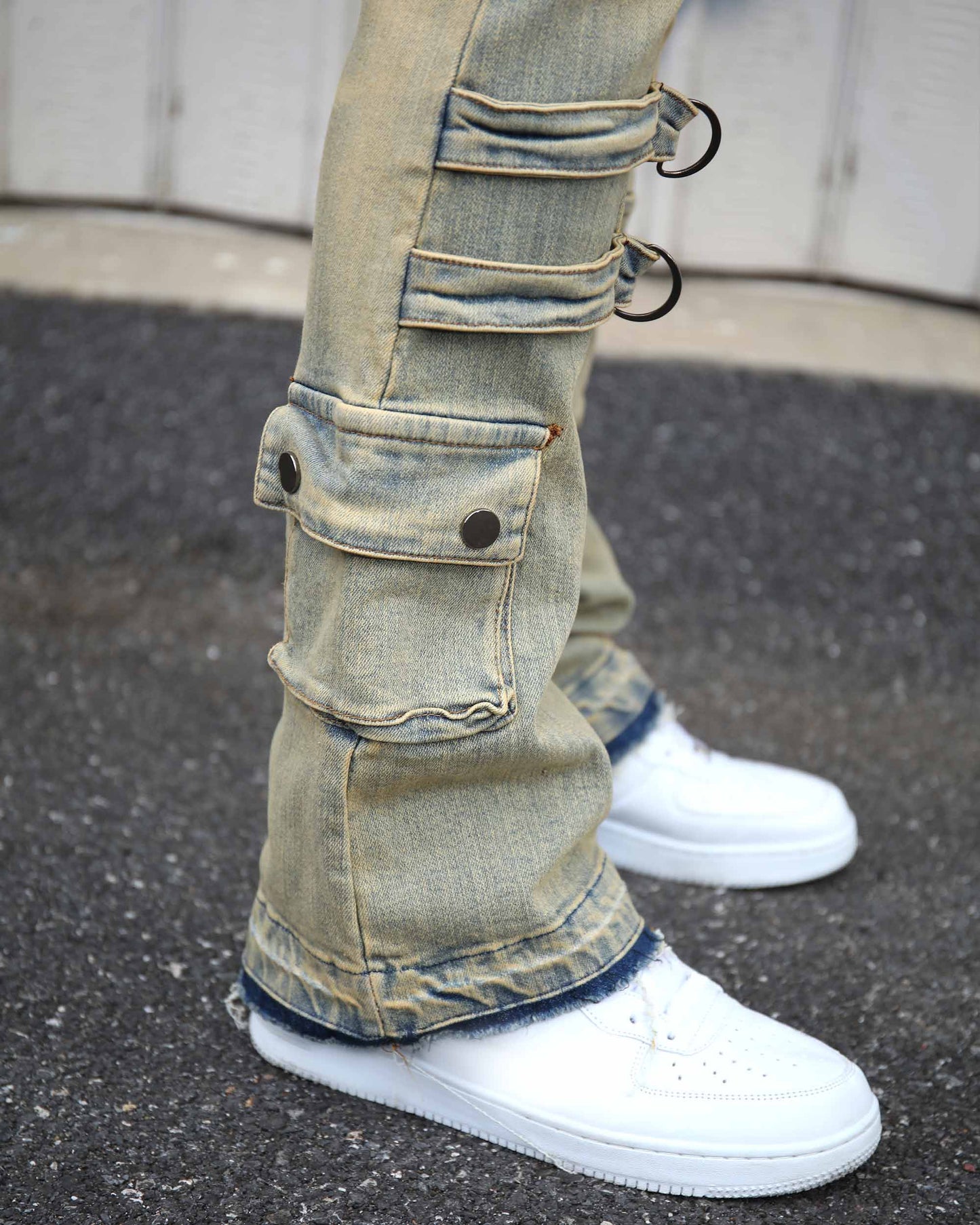 Logeqi industrial style cargo jeans with straps and pockets, styled with white sneakers