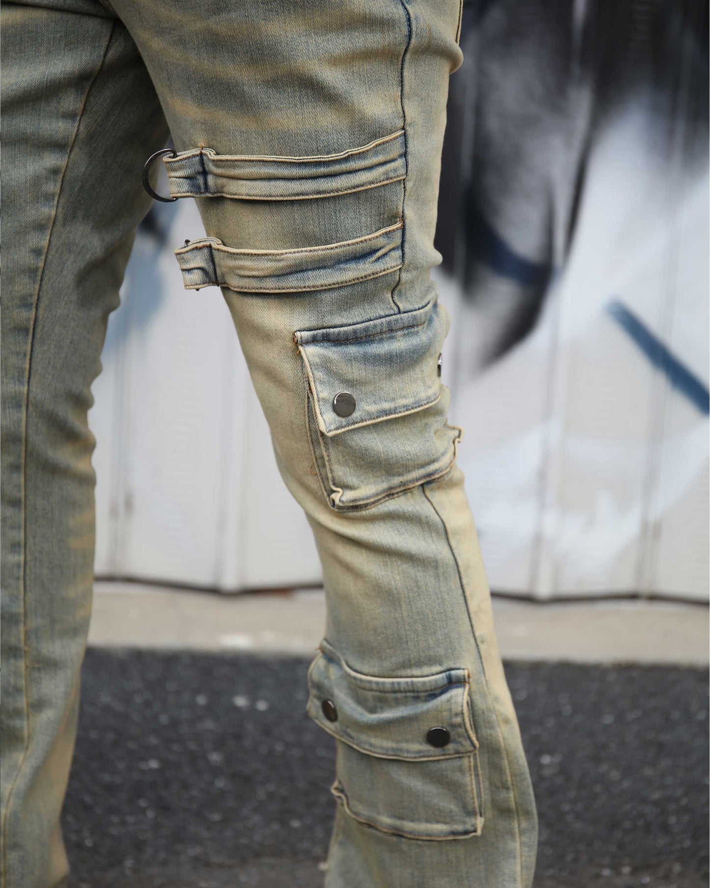 Logeqi industrial style cargo jeans featuring multiple pockets and straps for a rugged look
