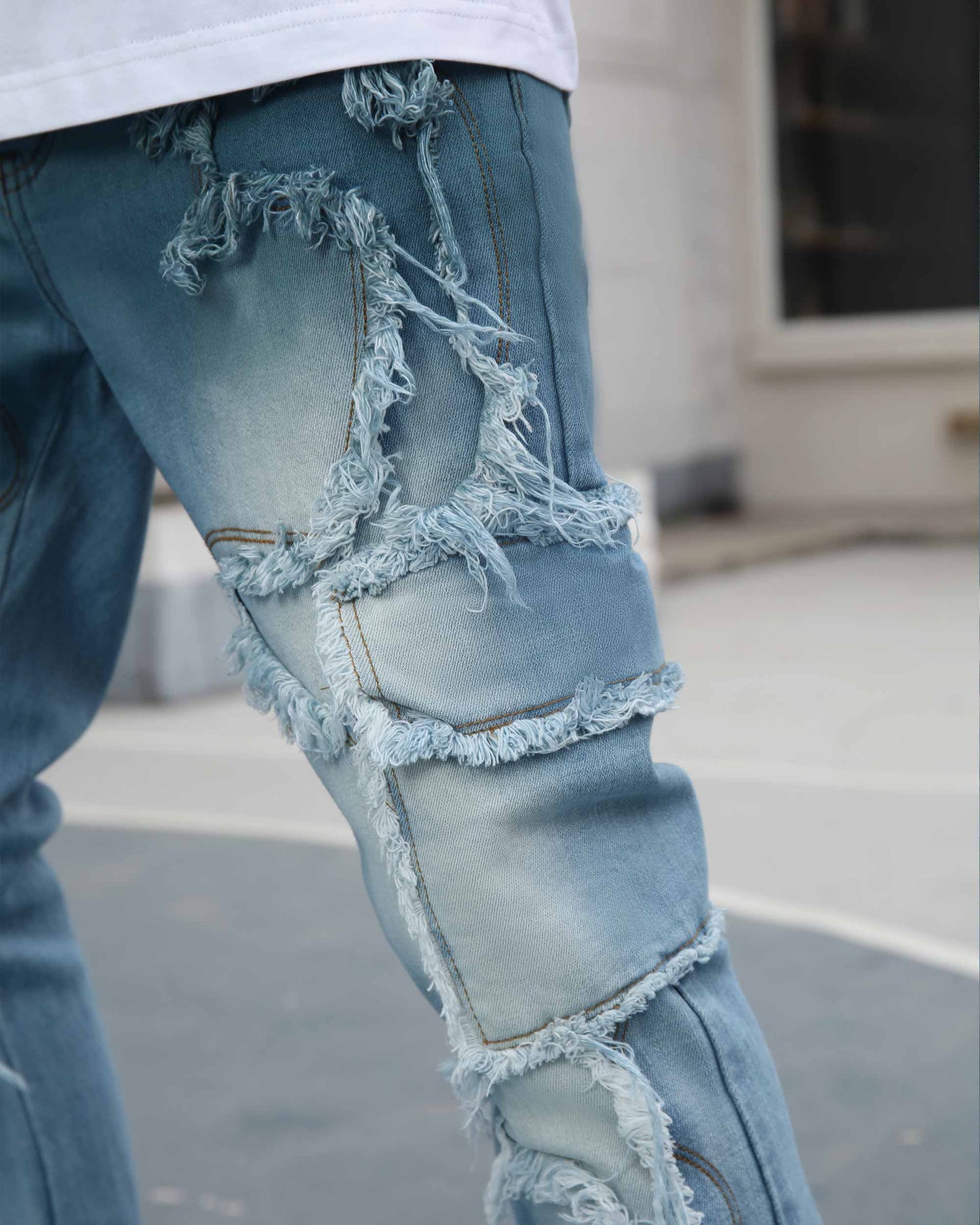 Logeqi irregular blue stacked jeans with distressed detailing for a stylish, trendy look