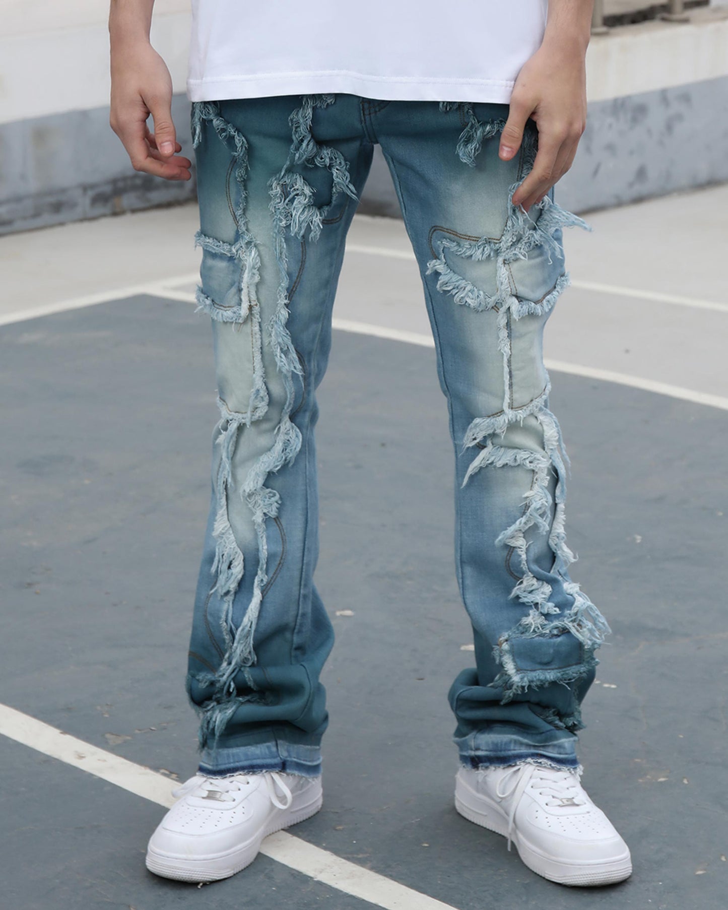 Logeqi irregular blue stacked jeans with distressed details and a trendy fit for casual wear