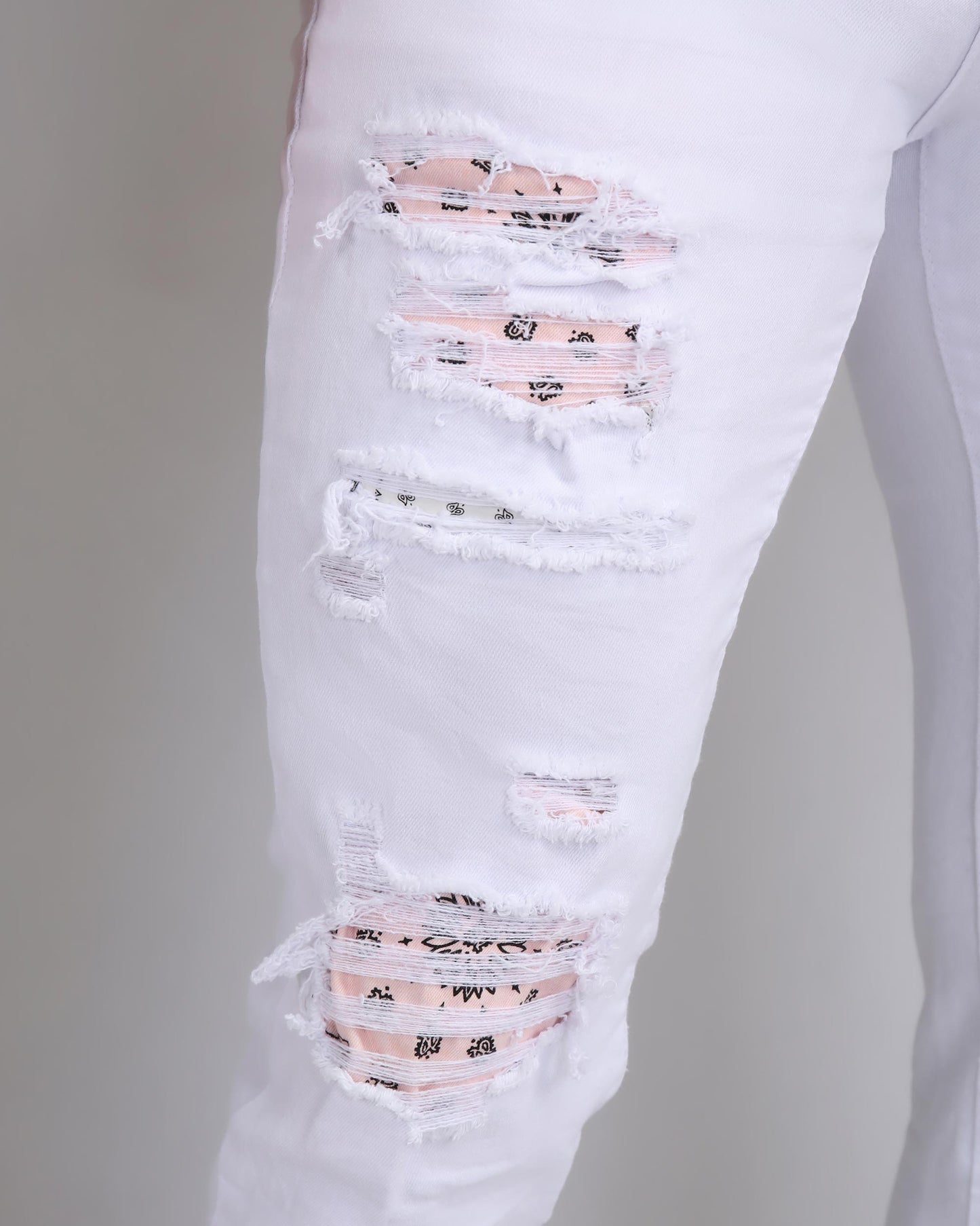 Logeqi irregular ripped white jeans featuring stylish distressed details and a comfortable fit