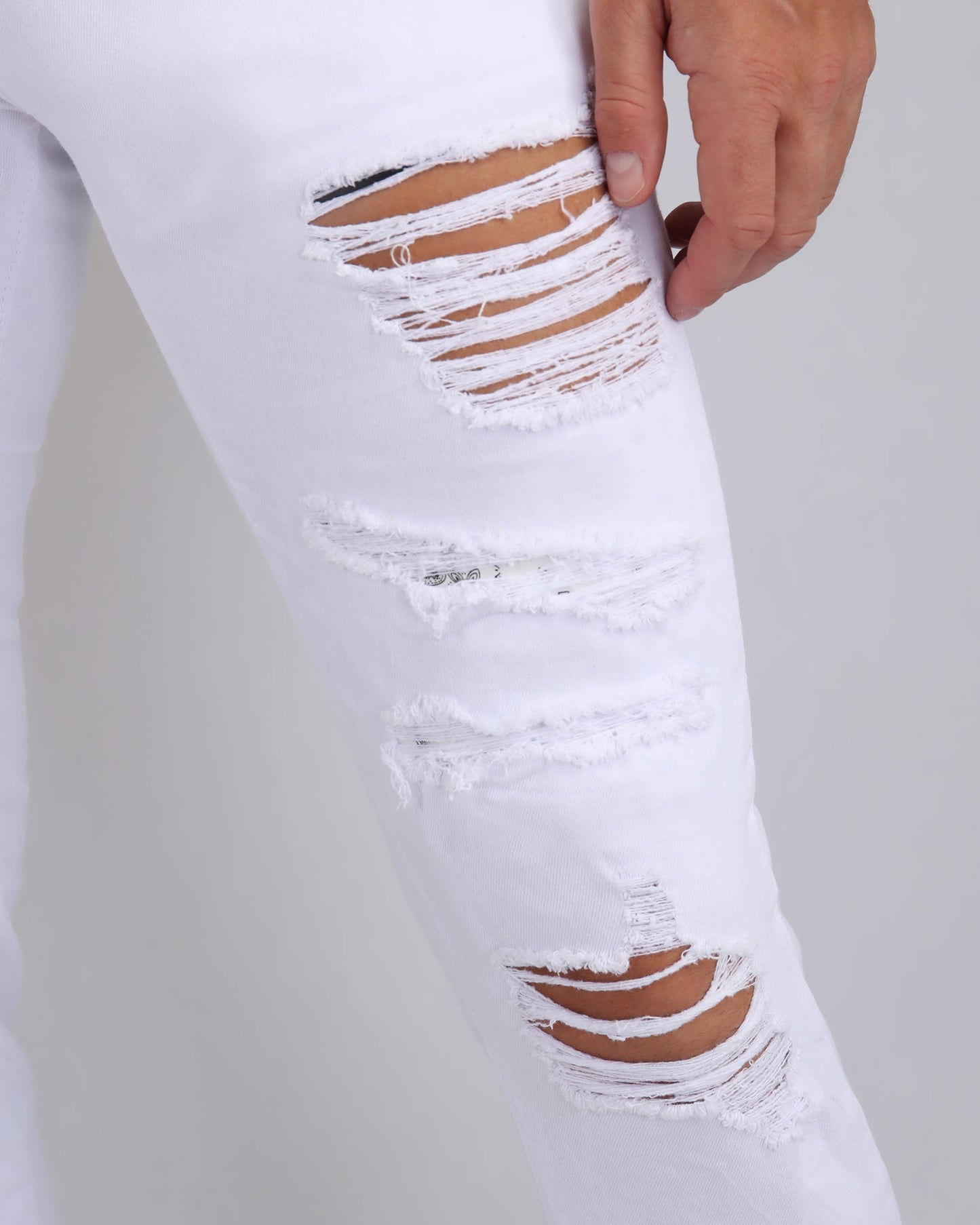 Logeqi irregular ripped white jeans with stylish distressed detailing for a trendy look