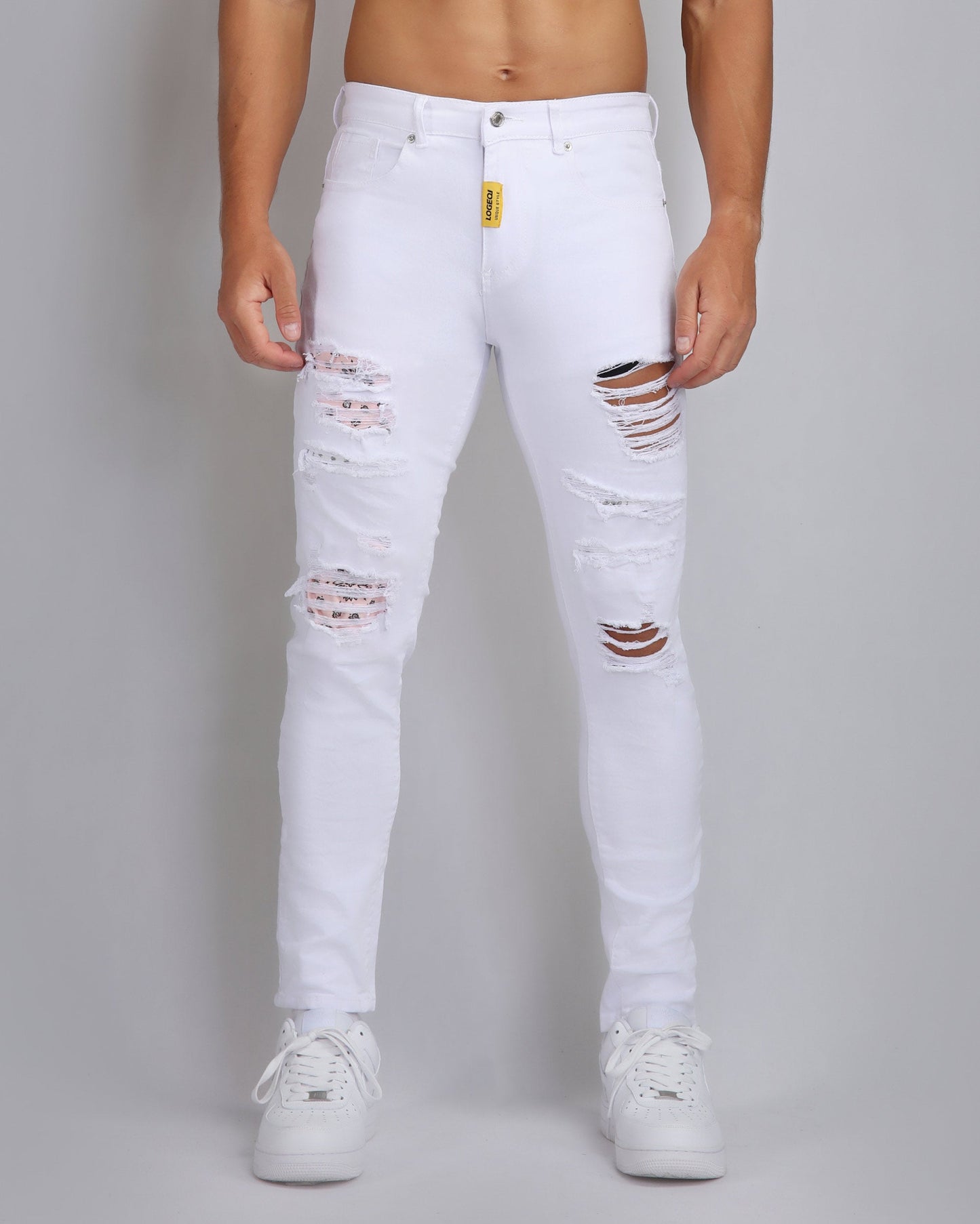 Logeqi irregular ripped white jeans with a fitted style and distressed design for a trendy look