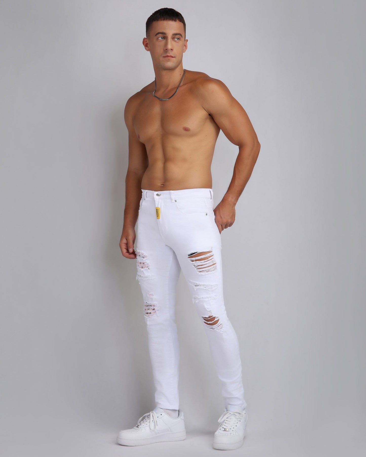 Logeqi irregular ripped white jeans featuring a slim fit and distressed design for a trendy look