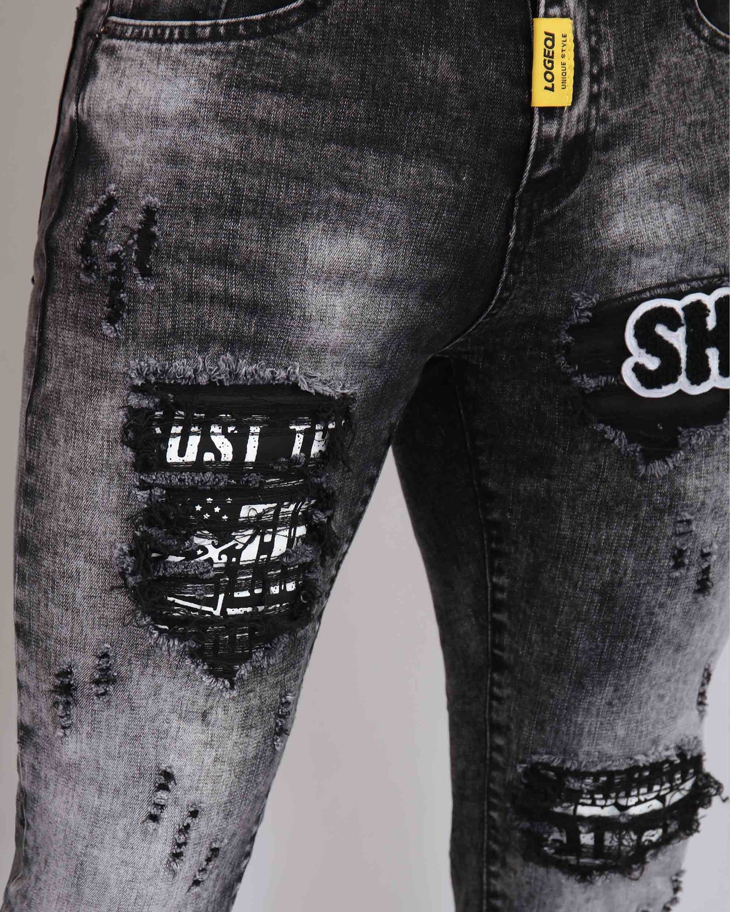 Logeqi Irregular Wash Ripped Jeans with Distressed Details and Unique Design for Casual Wear