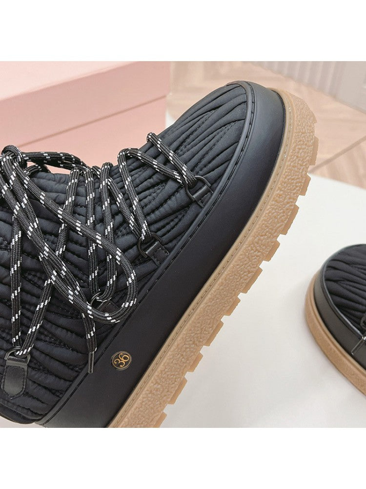 Wholesale7 black lambswool snow boots with tan rugged sole and reflective laces for winter wear
