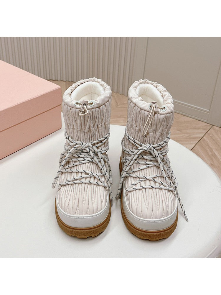 Wholesale7 laarzen lambswool snow boots in white with quilted design and sturdy brown sole