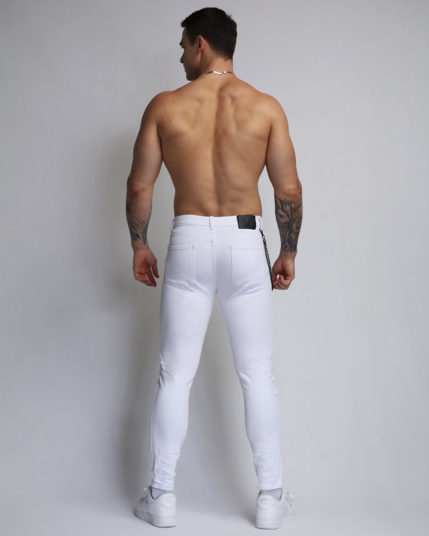 Logeqi large white ripped jeans with a slim fit and stylish design for casual wear