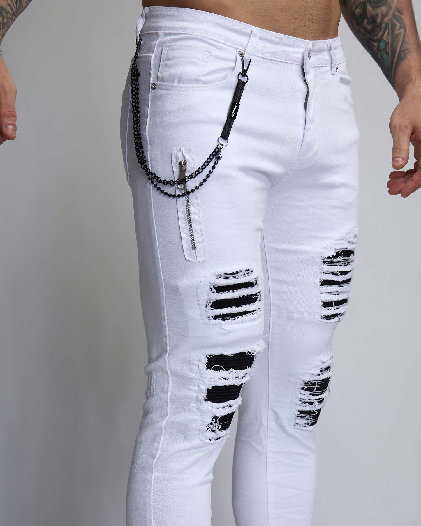 Logeqi large white ripped jeans with unique distressed design and stylish chain detail