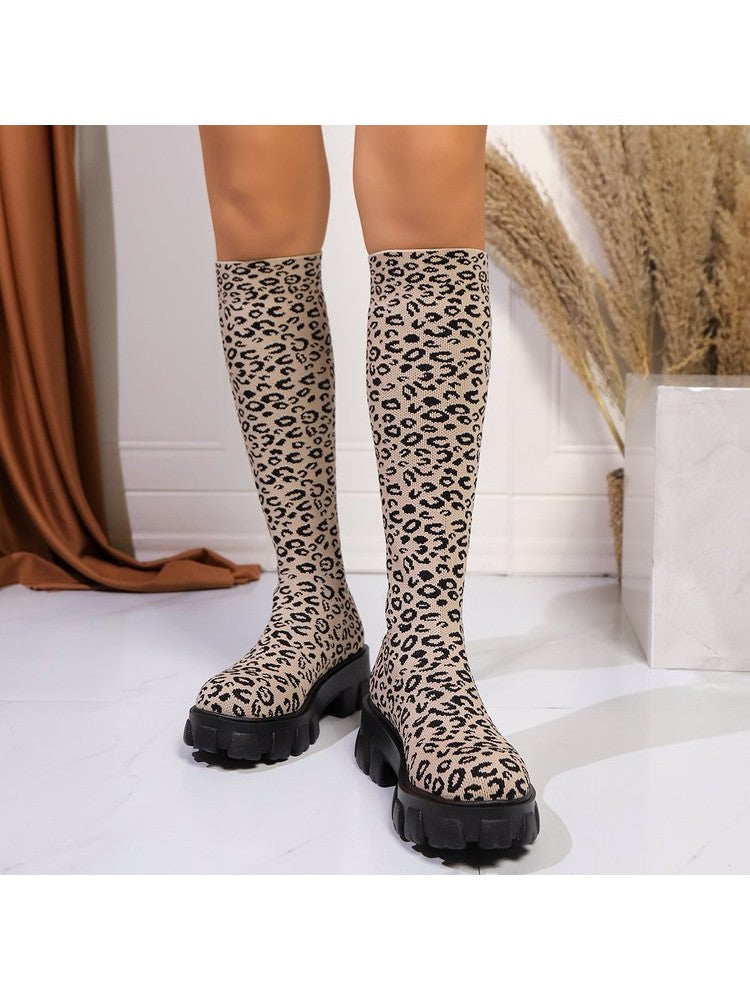 Leopard print chunky heel boots with a stylish design for a trendy look