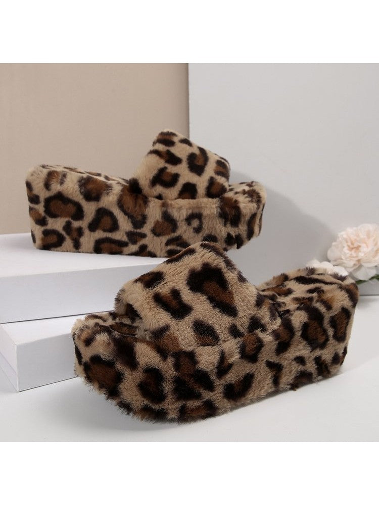 Leopard print fuzzy slippers with thick platform sole for comfortable indoor wear
