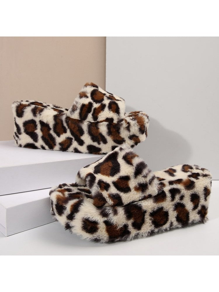 Leopard print fuzzy slippers from wholesale7 with soft plush material and open toe design