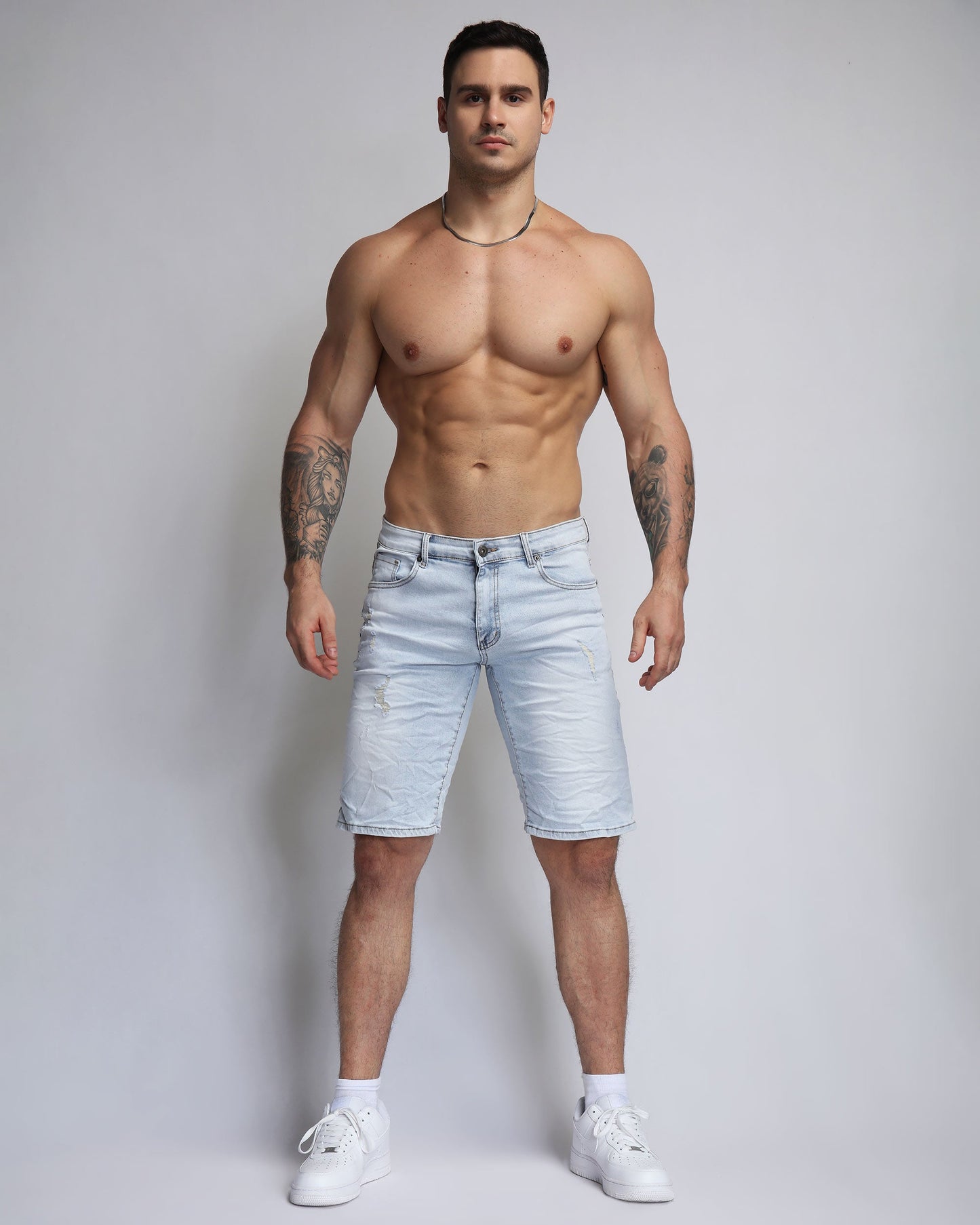 Logeqi light wash blue jeans denim shorts for a casual summer look on a model