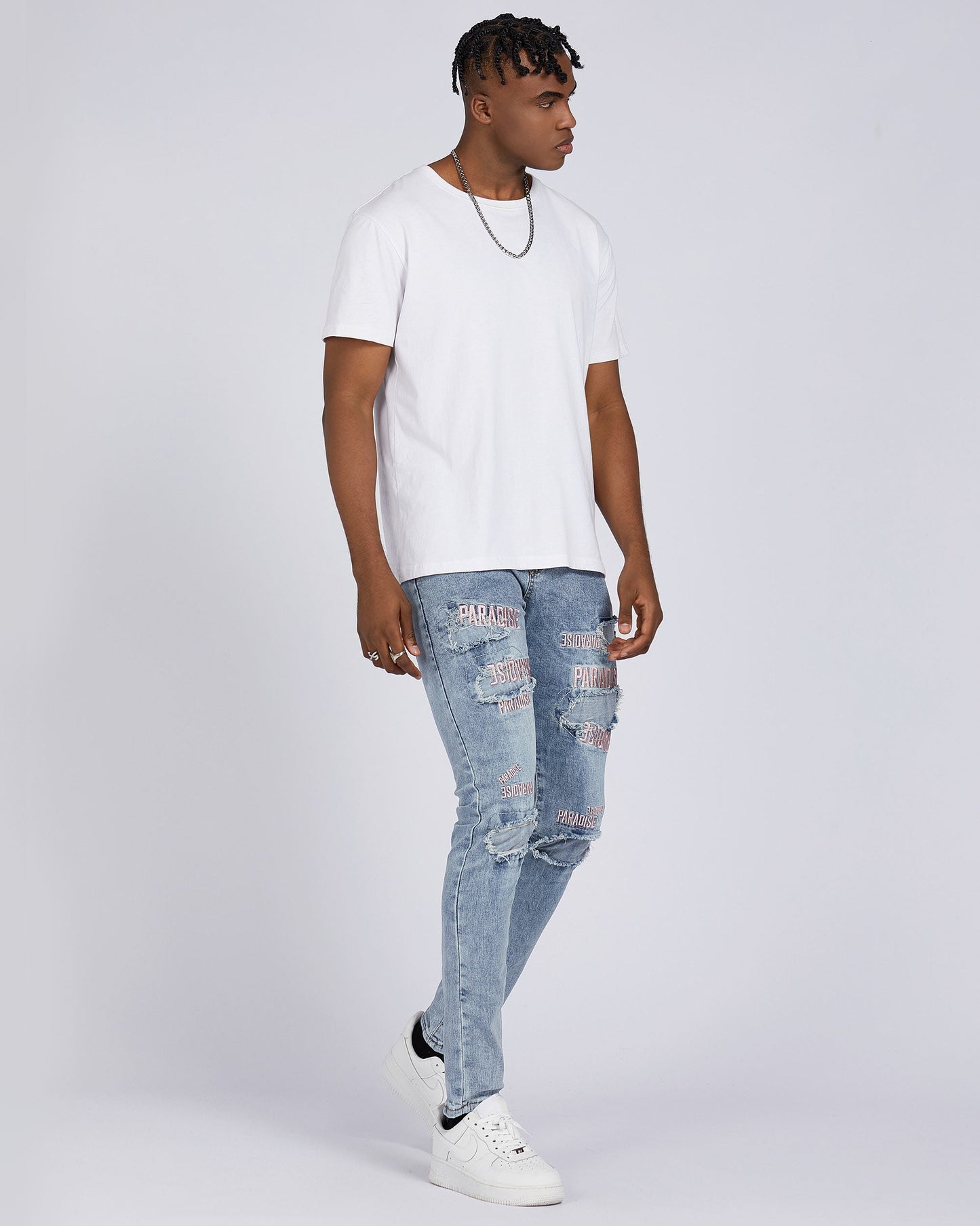 Logeqi light wash blue ripped jeans with distressed details for a trendy casual look
