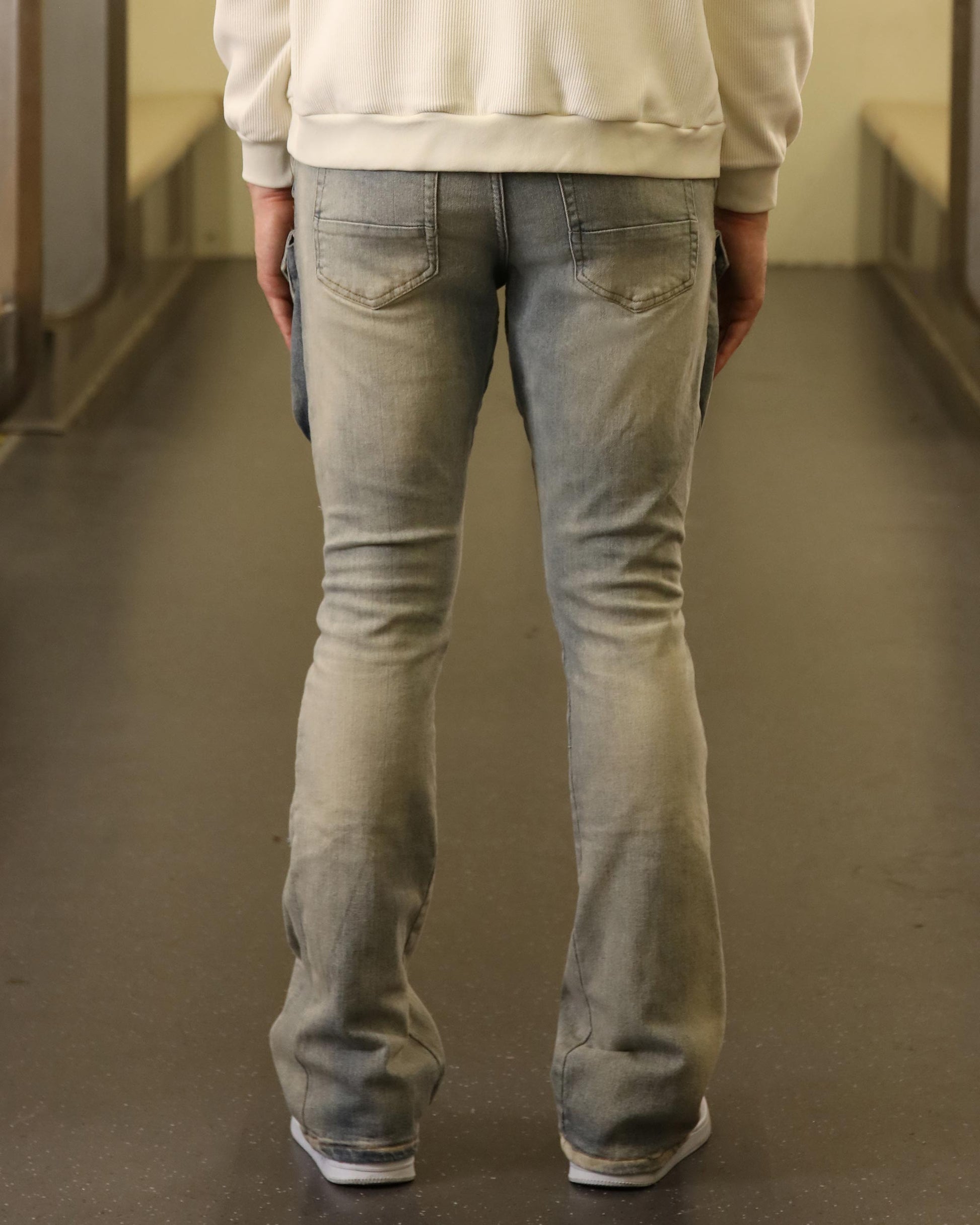 Logeqi light wash cargo jeans with a stylish flared design and back pocket detailing