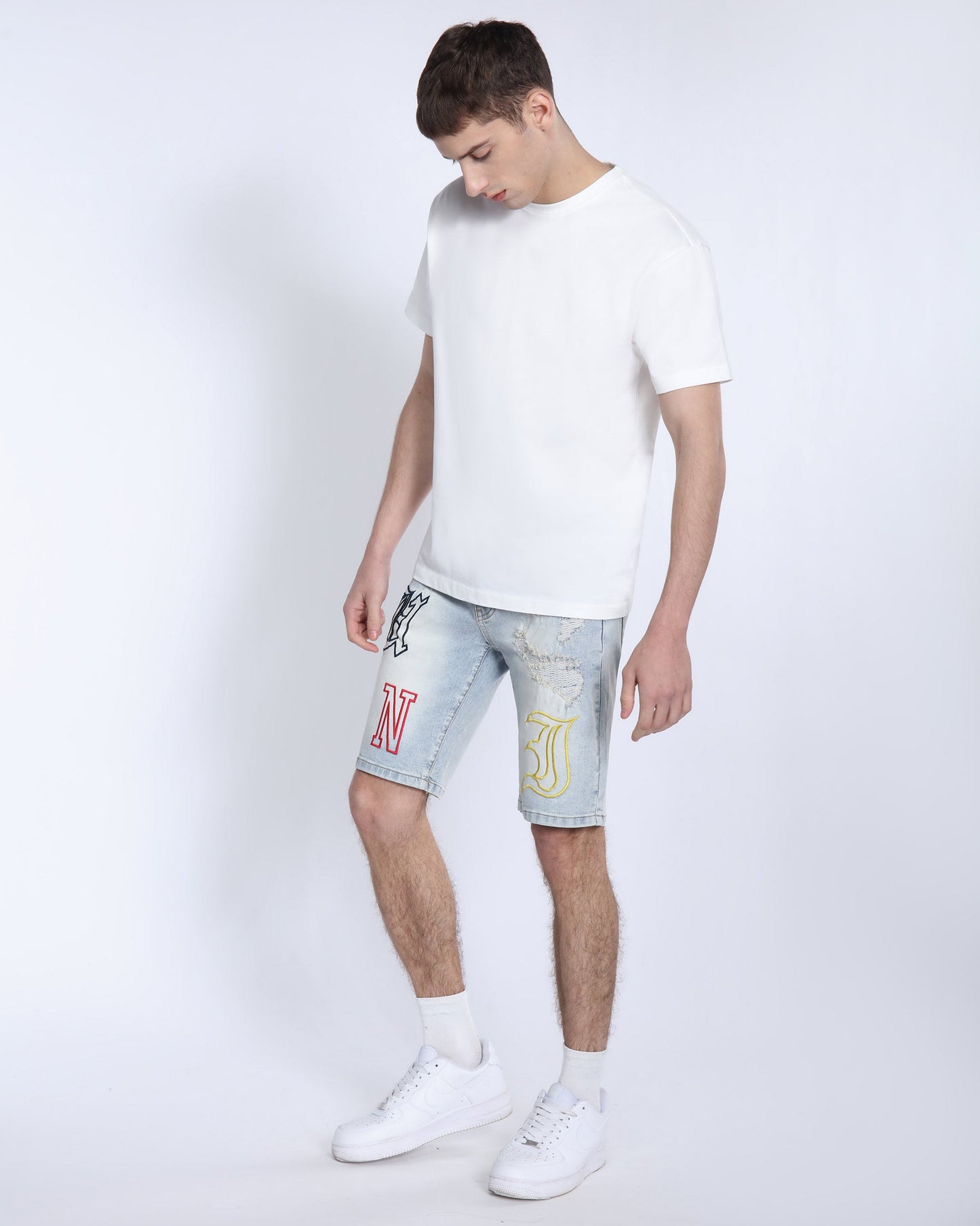 Logeqi light wash denim shorts featuring stylish graphics for a trendy summer look