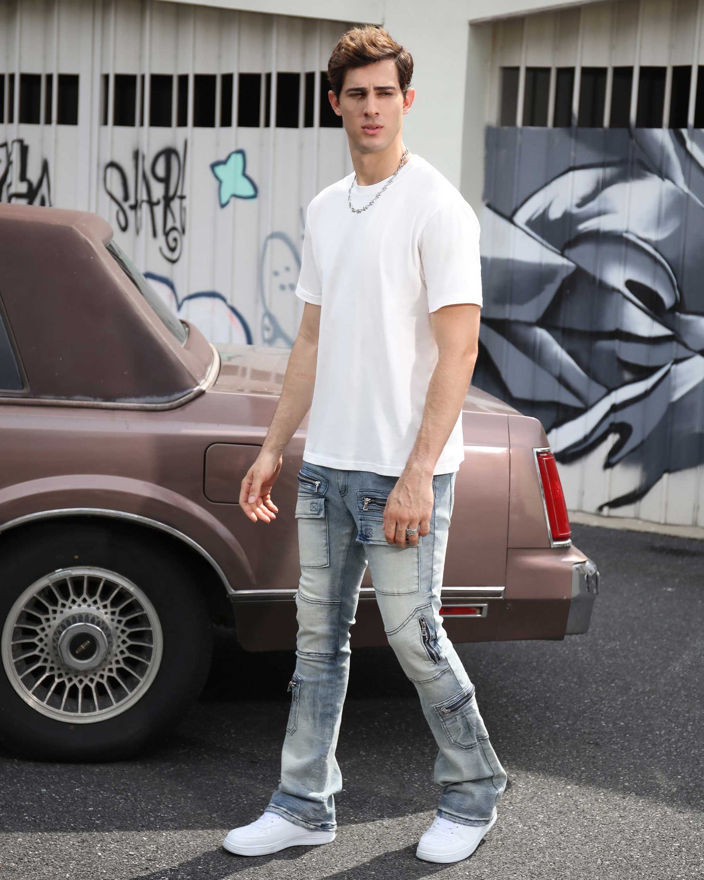 Logeqi light wash distressed cargo jeans paired with a white t-shirt for a casual look