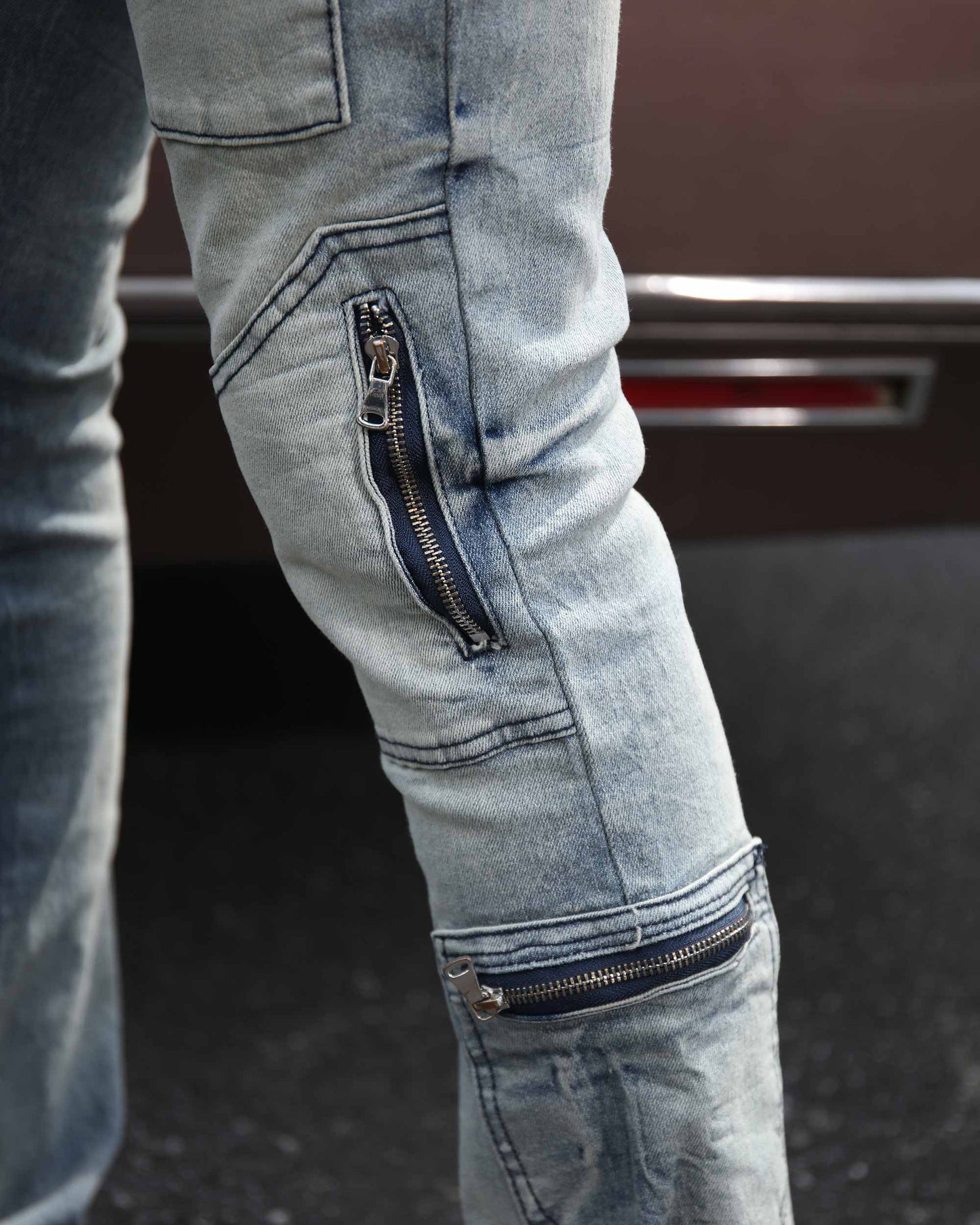 Logeqi light wash distressed cargo jeans with stylish zippers and unique design details