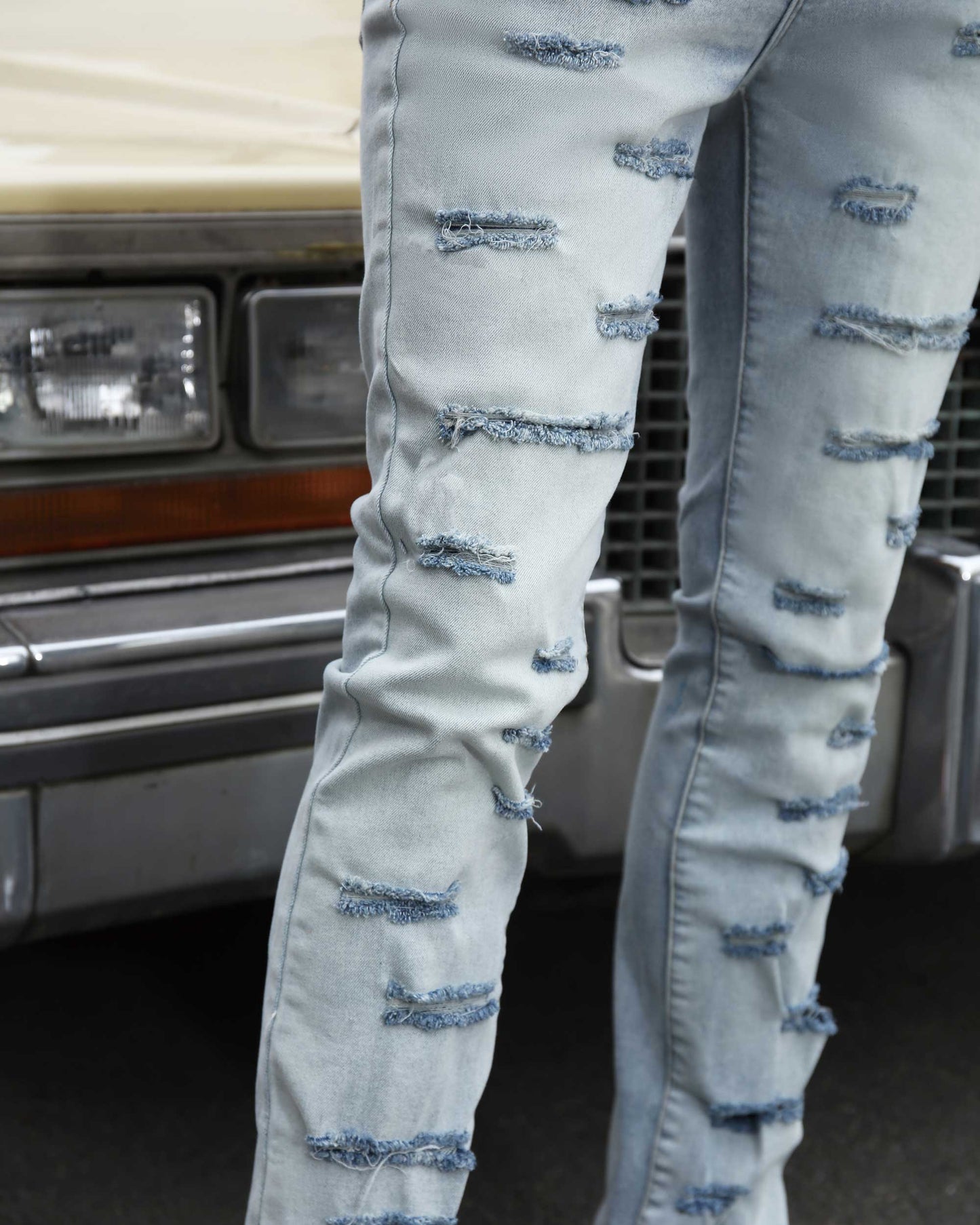 Logeqi light wash flared jeans with ripped detailing for a trendy casual look