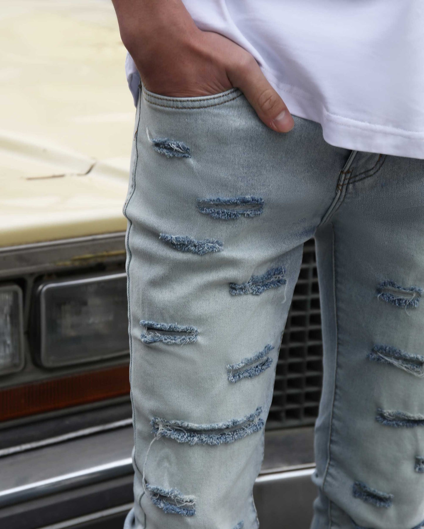 Logeqi light wash flared jeans featuring distressed details for a trendy casual look