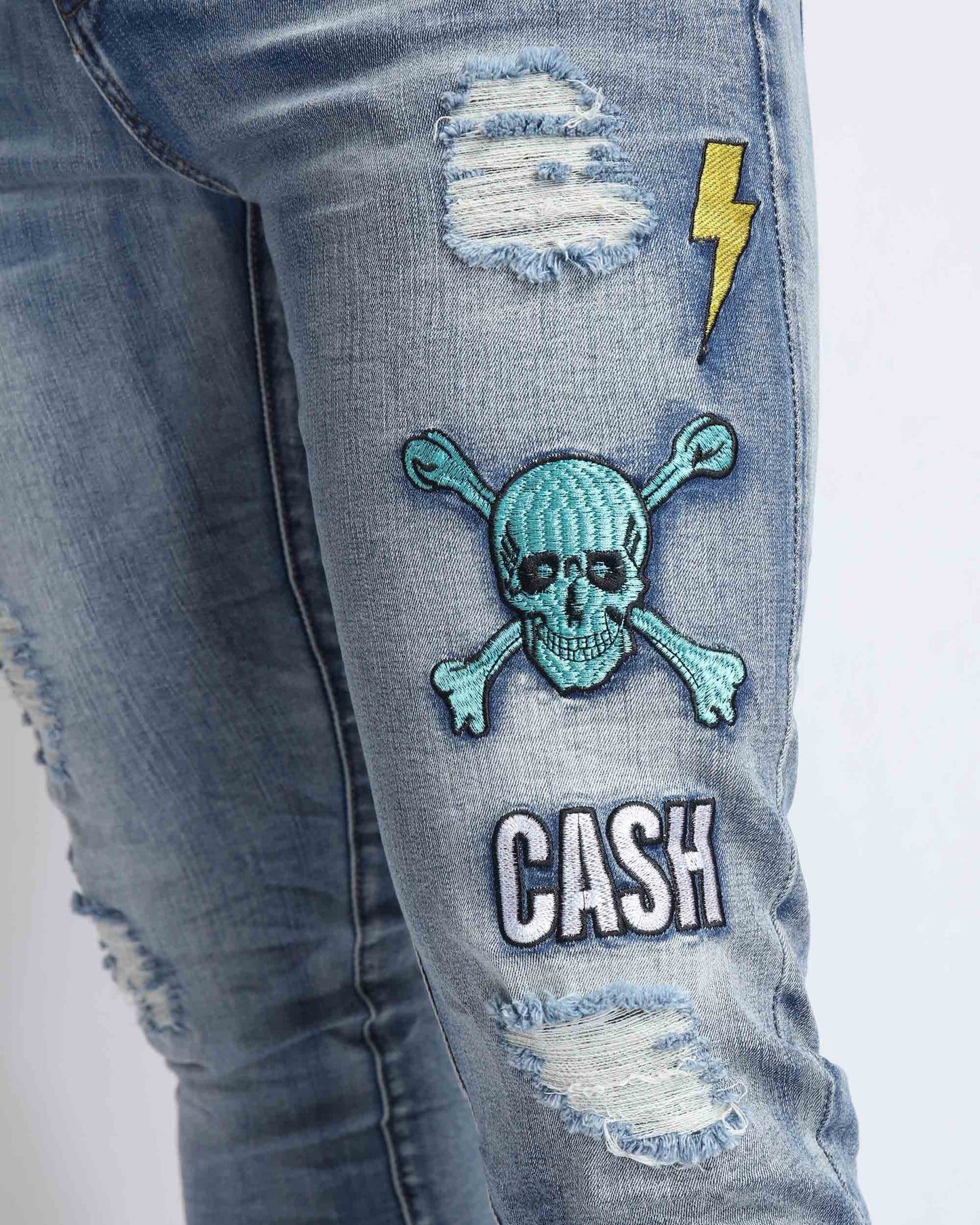 Logeqi light wash ripped jeans with skull and lightning patch details for a trendy look
