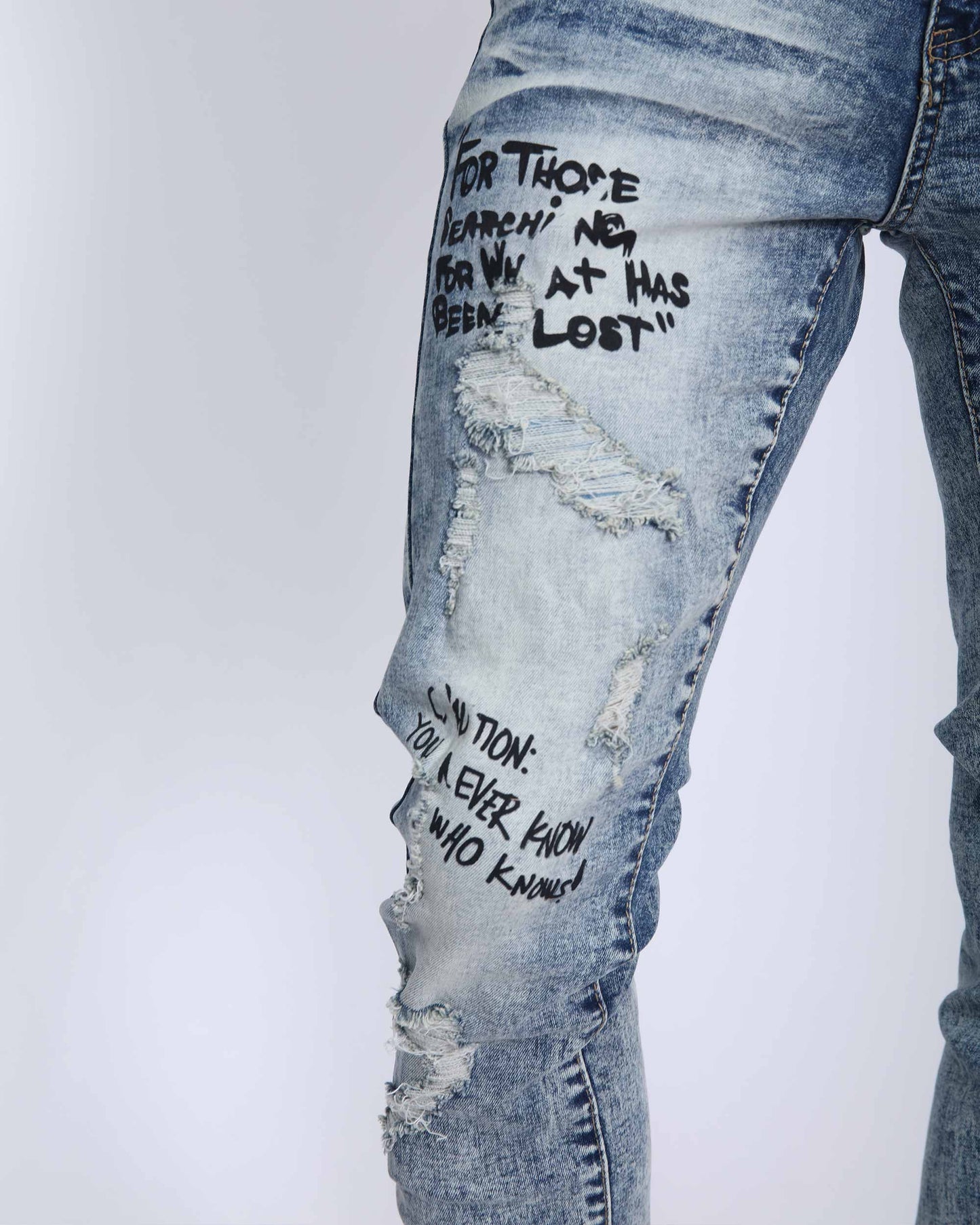 Logeqi light wash ripped jeans with unique stylish detailing and distressed design for a trendy look