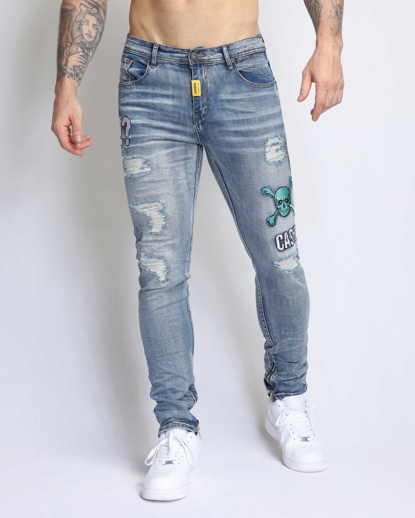 Logeqi light wash ripped jeans with unique graphic patches for a stylish casual look