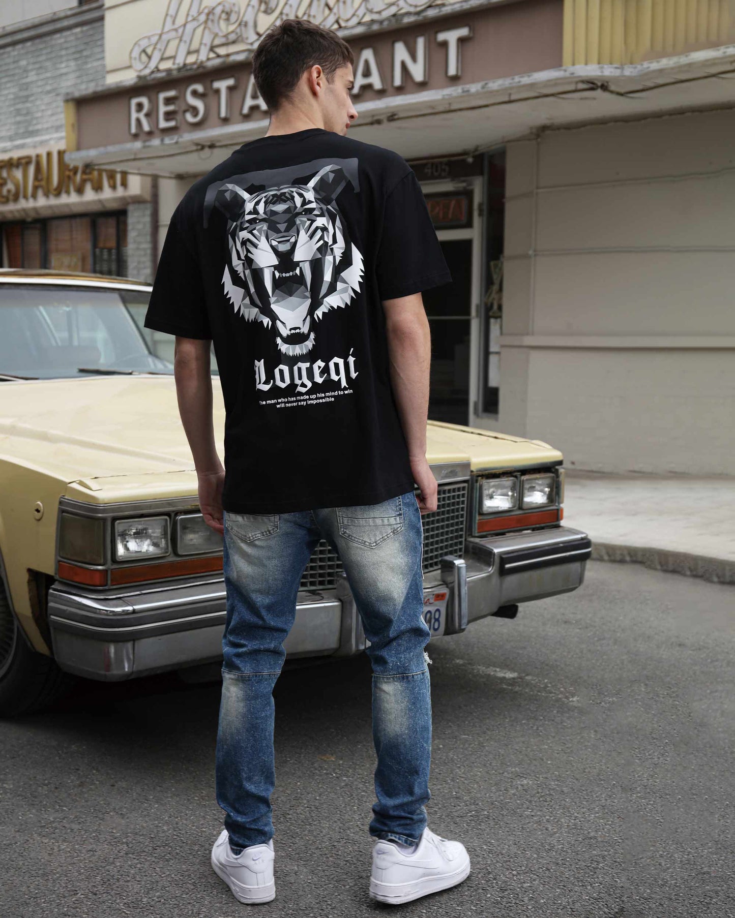 Logeqi medium wash distressed jeans with a stylish fit, perfect for casual outings.