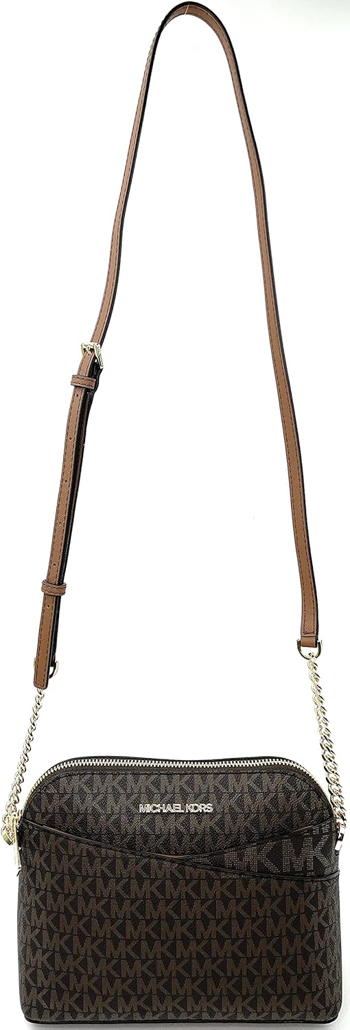 Michael Kors crossbody leather handbag in brown with iconic logo pattern and adjustable strap