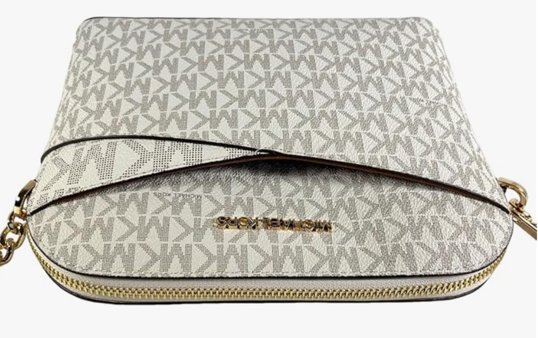 Michael Kors crossbody leather handbag with stylish logo pattern and gold hardware