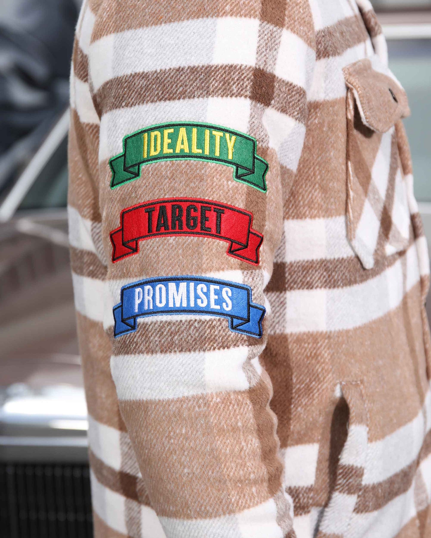 Logeqi modern plaid moto jacket with brown and white check pattern and colorful patches on sleeve