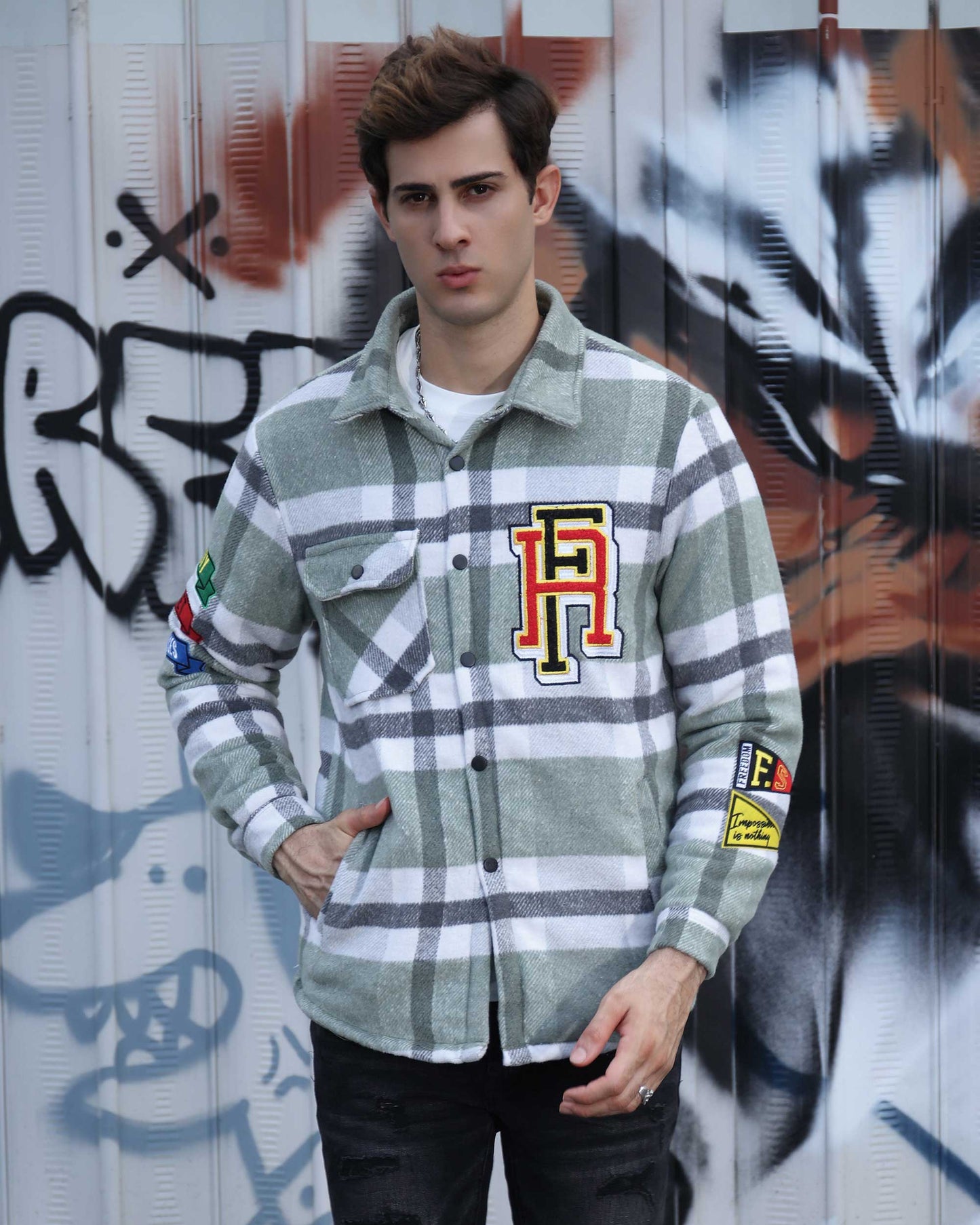 Logeqi modern plaid moto jacket in green and white with patches worn by male model